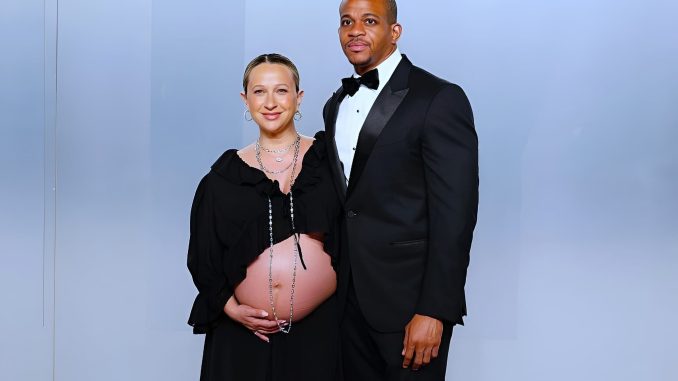 Geoffrey Ogunlesi with Jennifer Meyer